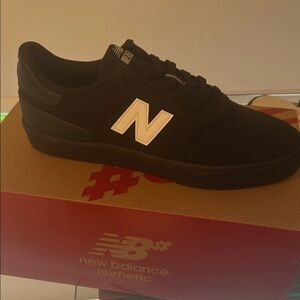 New Balance Black and White Skate Sneakers
